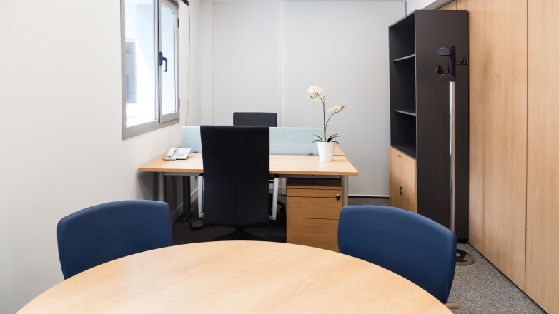 private two person office with meeting set